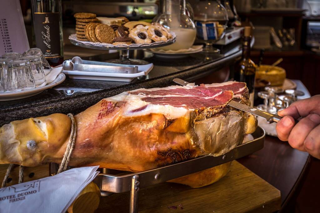 Whole Prosciutto di Parma on the bone, sliced to order at the Hotel Duomo Firenze breakfast