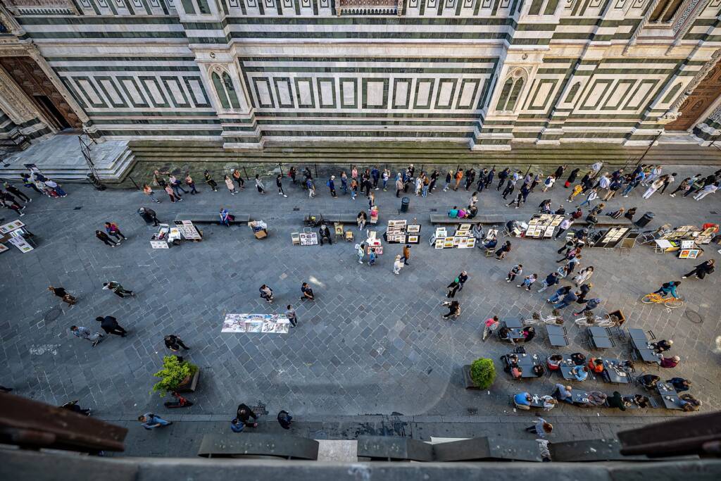 View from room 23 at Hotel Duomo Firenze looking down on Piazza del Duomo and the facade of Florence Cathedral