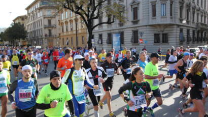 Runners at kilometer 2 of the Firenze Marathon in Florence