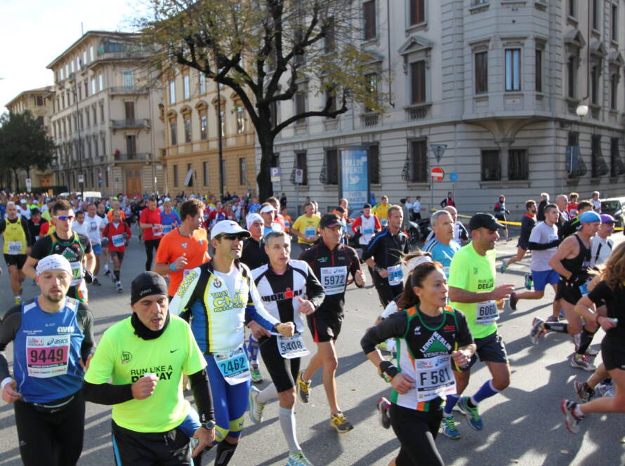 Runners at kilometer 2 of the Firenze Marathon in Florence