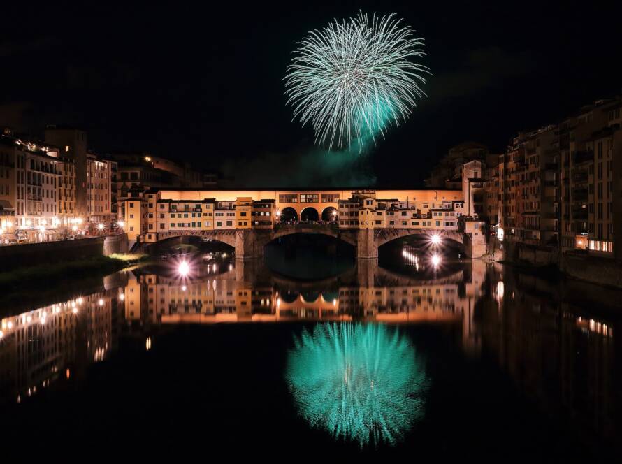 Fireworks over Ponte Vecchio and the Arno in Florence