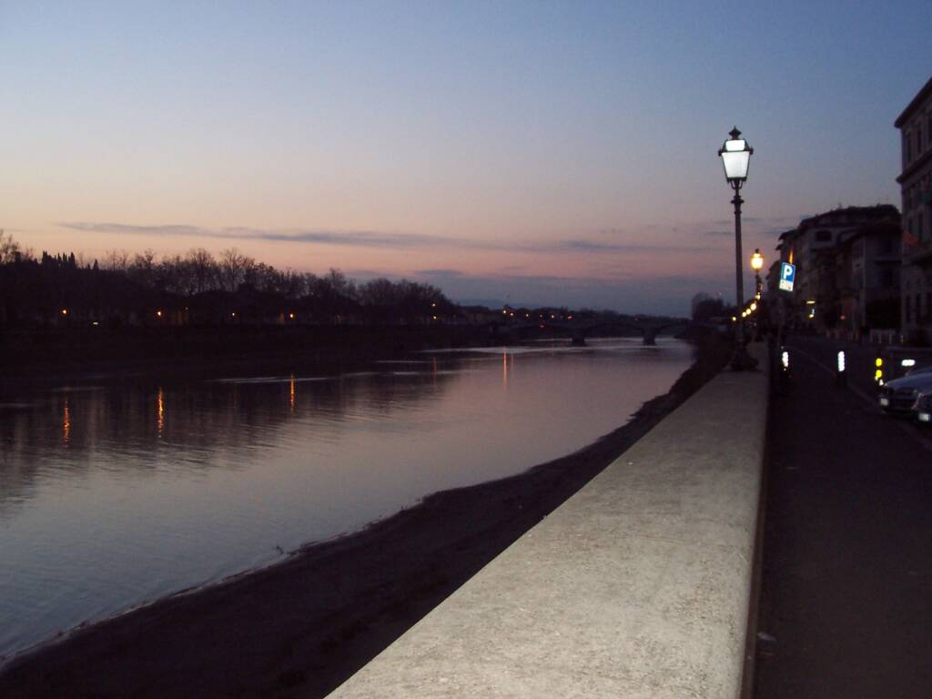 Sunset over the Arno river in Florence